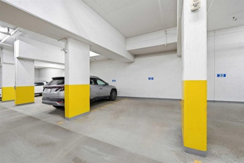 101-121 Quarry Way Se, Calgary, AB - Indoor Photo Showing Garage