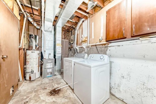 927 Midridge Drive Se, Calgary, AB - Indoor Photo Showing Laundry Room