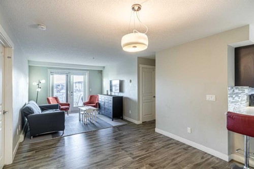 302-2300 Evanston Square Nw, Calgary, AB - Indoor Photo Showing Living Room