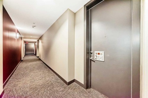 204-830 Centre Avenue Ne, Calgary, AB - Indoor Photo Showing Other Room