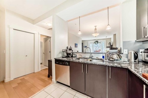 204-830 Centre Avenue Ne, Calgary, AB - Indoor Photo Showing Kitchen With Double Sink With Upgraded Kitchen