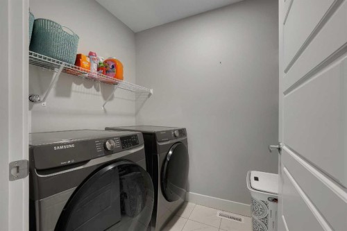 168 Evansfield Close Nw, Calgary, AB - Indoor Photo Showing Laundry Room