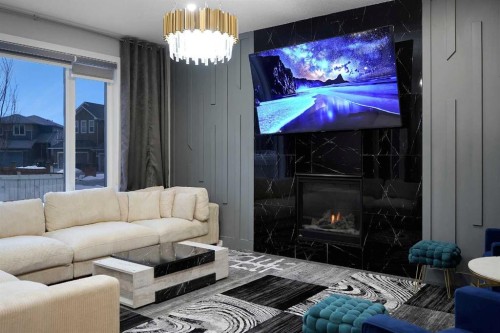 168 Evansfield Close Nw, Calgary, AB - Indoor Photo Showing Living Room With Fireplace