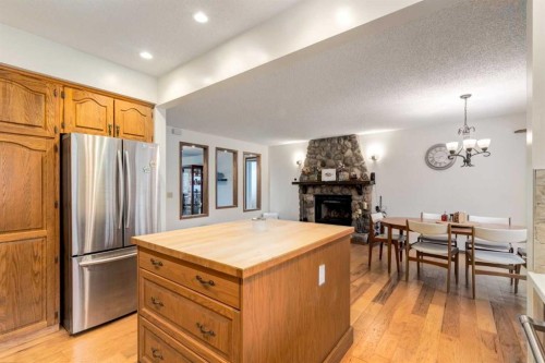 76 Sunmount Road Se, Calgary, AB - Indoor With Fireplace