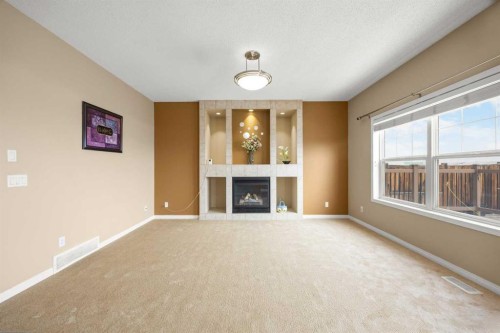 65 Panora Way Nw, Calgary, AB - Indoor With Fireplace