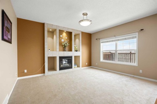 65 Panora Way Nw, Calgary, AB - Indoor With Fireplace