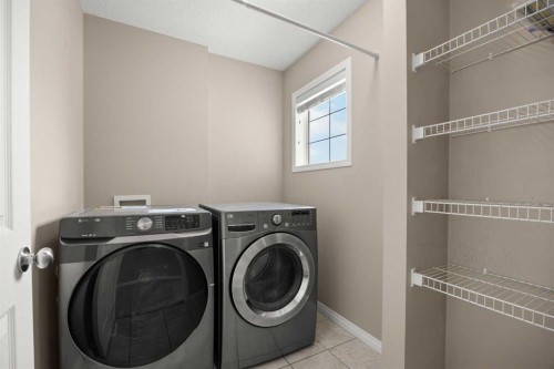 65 Panora Way Nw, Calgary, AB - Indoor Photo Showing Laundry Room