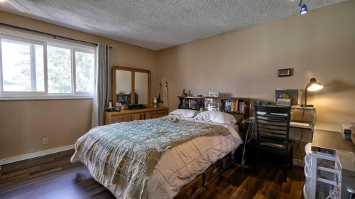 35 Riverbirch Road Se, Calgary, AB - Indoor Photo Showing Bedroom