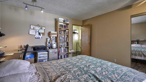 35 Riverbirch Road Se, Calgary, AB - Indoor Photo Showing Bedroom