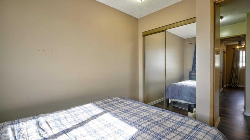 35 Riverbirch Road Se, Calgary, AB - Indoor Photo Showing Bedroom