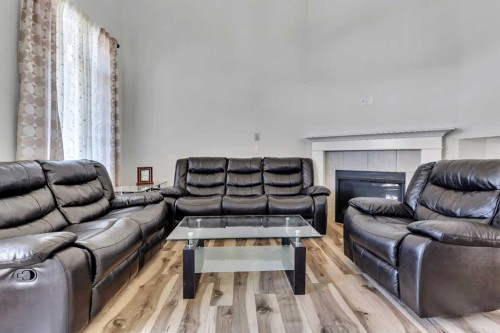 44 Cityside Rise Ne, Calgary, AB - Indoor Photo Showing Living Room With Fireplace