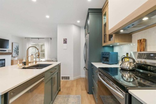 46 Prestwick Rise Se, Calgary, AB - Indoor Photo Showing Kitchen With Double Sink With Upgraded Kitchen