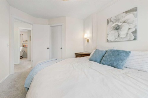 46 Prestwick Rise Se, Calgary, AB - Indoor Photo Showing Bedroom