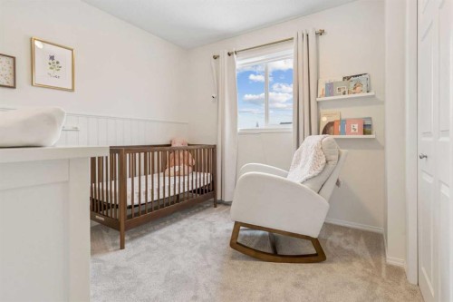 46 Prestwick Rise Se, Calgary, AB - Indoor Photo Showing Bedroom