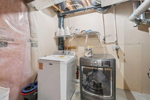 46 Prestwick Rise Se, Calgary, AB - Indoor Photo Showing Laundry Room