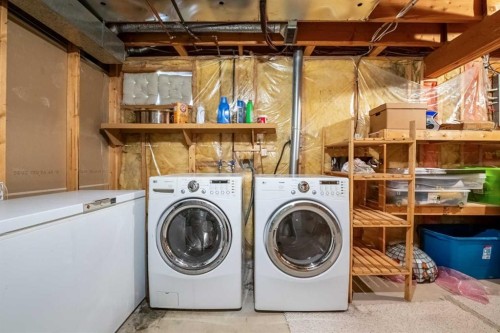 83 Deerbow Place Se, Calgary, AB - Indoor Photo Showing Laundry Room