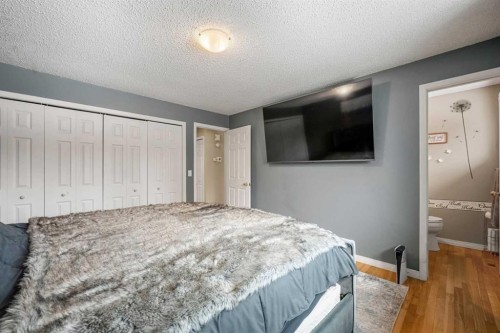 83 Deerbow Place Se, Calgary, AB - Indoor Photo Showing Bedroom