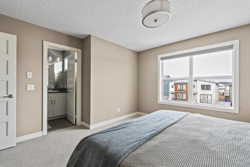 730 Walden Drive Se, Calgary, AB - Indoor Photo Showing Bedroom
