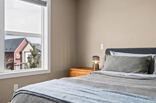 730 Walden Drive Se, Calgary, AB - Indoor Photo Showing Bedroom
