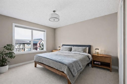 730 Walden Drive Se, Calgary, AB - Indoor Photo Showing Bedroom