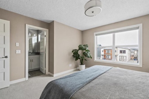 730 Walden Drive Se, Calgary, AB - Indoor Photo Showing Bedroom