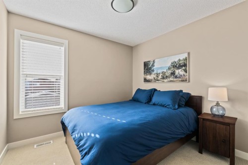 730 Walden Drive Se, Calgary, AB - Indoor Photo Showing Bedroom