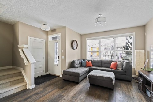 730 Walden Drive Se, Calgary, AB - Indoor Photo Showing Living Room