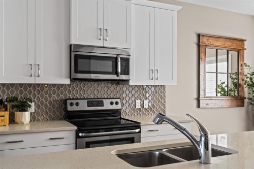 730 Walden Drive Se, Calgary, AB - Indoor Photo Showing Kitchen With Double Sink