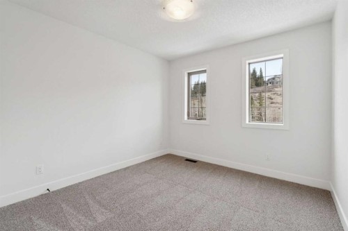 1 Discovery Ridge Link Sw, Calgary, AB - Indoor Photo Showing Other Room
