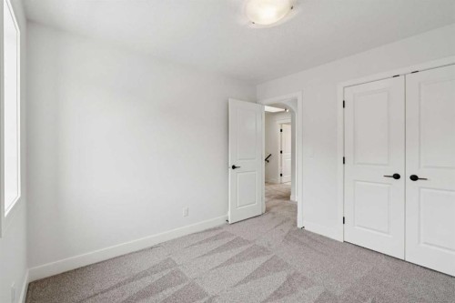 1 Discovery Ridge Link Sw, Calgary, AB - Indoor Photo Showing Other Room