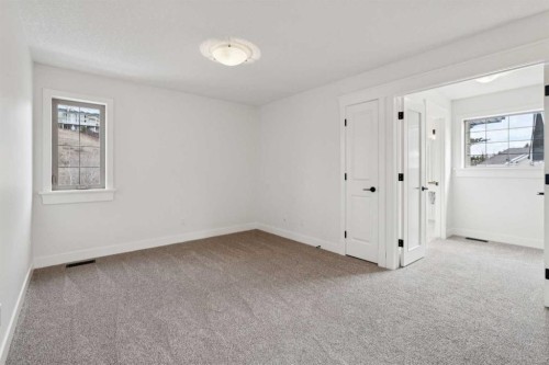 1 Discovery Ridge Link Sw, Calgary, AB - Indoor Photo Showing Other Room
