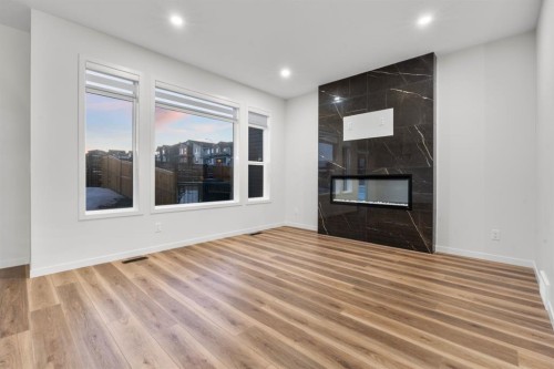 353 Herron Mews Ne, Calgary, AB - Indoor With Fireplace