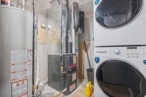 353 Herron Mews Ne, Calgary, AB - Indoor Photo Showing Laundry Room
