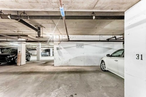 308-718 12 Avenue Sw, Calgary, AB - Indoor Photo Showing Garage