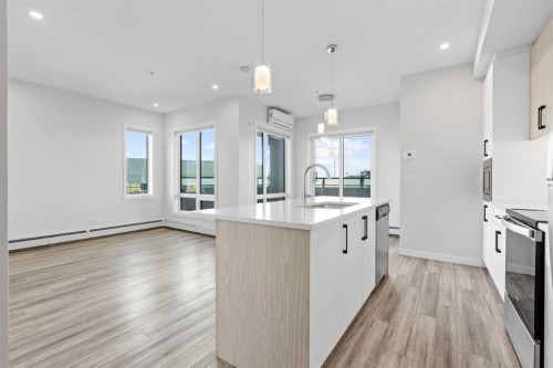 116-238 Sage Valley Common Nw, Calgary, AB - Indoor Photo Showing Kitchen With Upgraded Kitchen