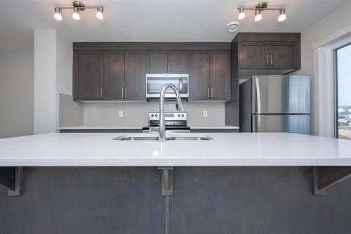 412 Seton Circle Se, Calgary, AB - Indoor Photo Showing Kitchen