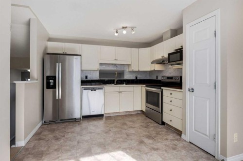 79 Copperfield Court Se, Calgary, AB - Indoor Photo Showing Kitchen