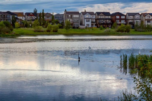 79 Copperfield Court Se, Calgary, AB - Outdoor With Body Of Water With View