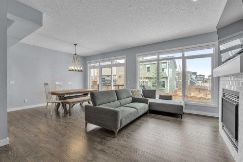 78 Sage Bluff View Nw, Calgary, AB - Indoor Photo Showing Living Room With Fireplace