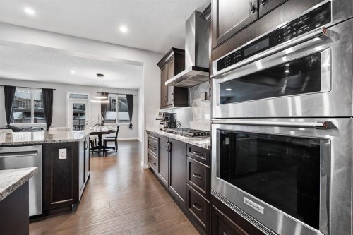 308 Lucas Way Nw, Calgary, AB - Indoor Photo Showing Kitchen With Stainless Steel Kitchen With Upgraded Kitchen