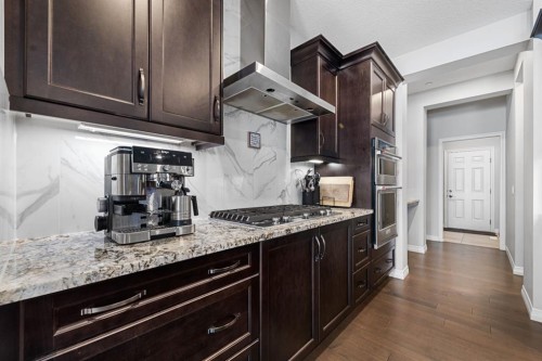 308 Lucas Way Nw, Calgary, AB - Indoor Photo Showing Kitchen With Upgraded Kitchen