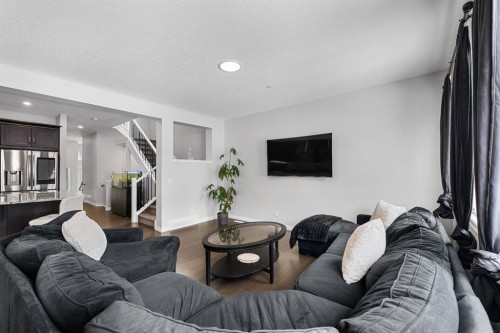 308 Lucas Way Nw, Calgary, AB - Indoor Photo Showing Living Room