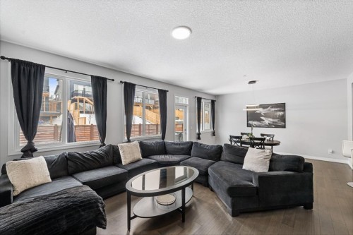 308 Lucas Way Nw, Calgary, AB - Indoor Photo Showing Living Room