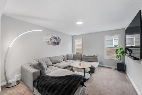 308 Lucas Way Nw, Calgary, AB - Indoor Photo Showing Living Room