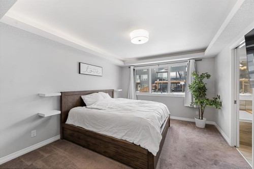 308 Lucas Way Nw, Calgary, AB - Indoor Photo Showing Bedroom