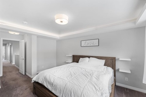 308 Lucas Way Nw, Calgary, AB - Indoor Photo Showing Bedroom