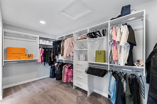 308 Lucas Way Nw, Calgary, AB - Indoor With Storage