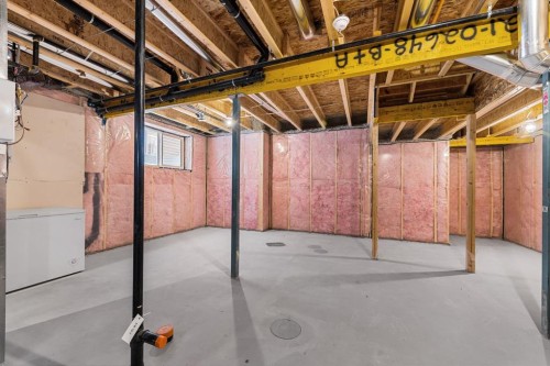 308 Lucas Way Nw, Calgary, AB - Indoor Photo Showing Basement