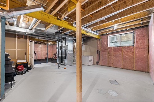 308 Lucas Way Nw, Calgary, AB - Indoor Photo Showing Basement