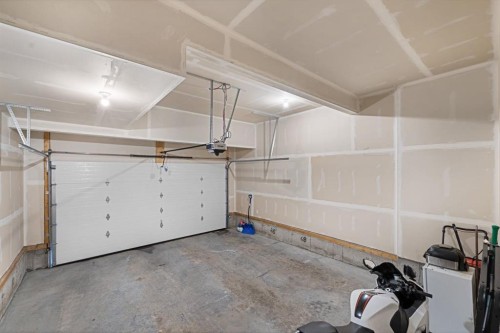 308 Lucas Way Nw, Calgary, AB - Indoor Photo Showing Garage